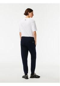 Lacoste Spodnie dresowe XF7077 Granatowy Regular Fit. Kolor: niebieski. Materiał: bawełna, dresówka, syntetyk