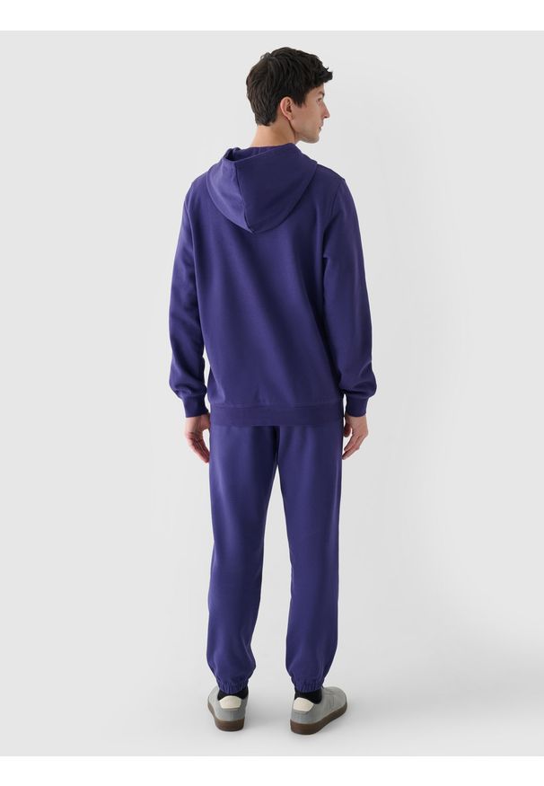 4f - 4F Spodnie dresowe joggery męskie - granatowe XL. Kolor: niebieski. Materiał: dresówka. Wzór: ze splotem, gładki