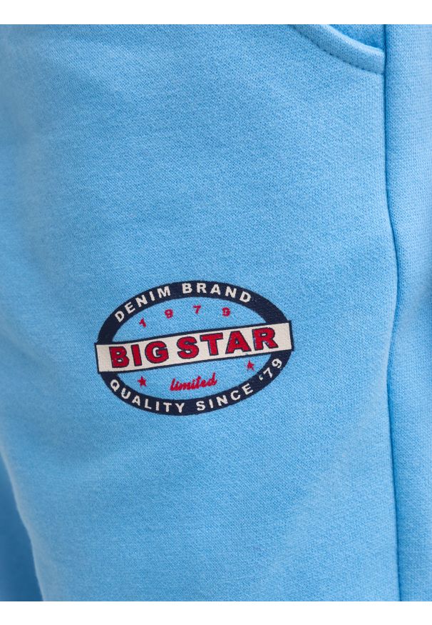 Big-Star - Spodnie chłopięce dresowe niebieskie Midasp 401. Okazja: na uczelnię. Kolor: niebieski. Materiał: dresówka. Wzór: nadruk. Styl: sportowy