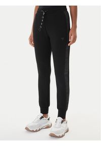 Guess Spodnie dresowe V2YB18 K7UW2 Czarny Regular Fit. Kolor: czarny. Materiał: wiskoza #1