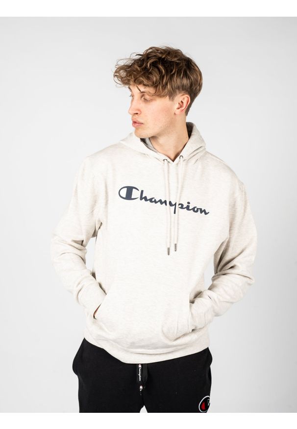 Champion Bluza "Hoodie" | HBGF89HY07718 | Mężczyzna | Szary. Okazja: na co dzień. Typ kołnierza: kaptur. Kolor: szary. Materiał: poliester, bawełna. Wzór: aplikacja. Styl: casual