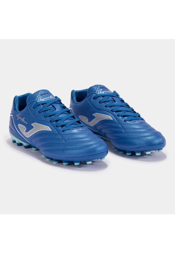 Buty do piłki nożnej dla dorosłych Joma Aguila lanki treningowe. Kolor: niebieski. Sport: piłka nożna