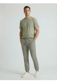 Sinsay - Bawełniane spodnie jogger - zielony. Kolor: zielony. Materiał: bawełna #1