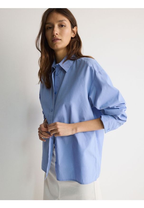 Reserved - Koszula oversize - niebieski. Kolor: niebieski. Materiał: tkanina, bawełna