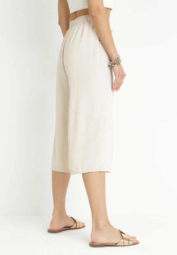 Born2be - Jasnobeżowe Szerokie Spodnie z Gumką w Pasie Sliverta. Kolor: beżowy