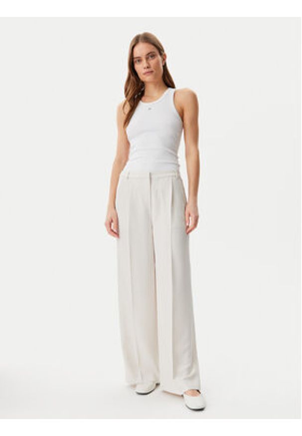 Calvin Klein Spodnie materiałowe Travel Twill K20K208214 Szary Wide Leg. Kolor: szary. Materiał: satyna, syntetyk