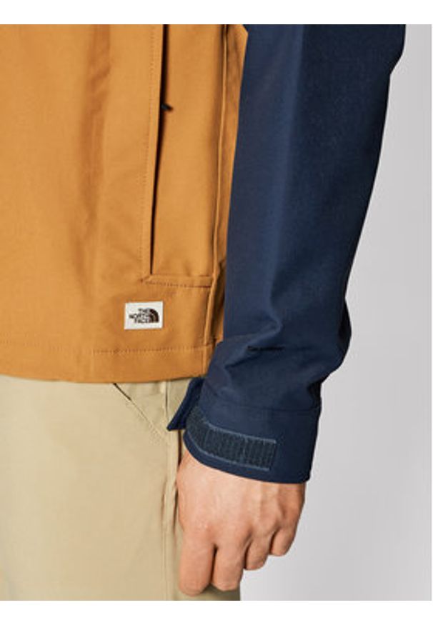 The North Face Kurtka anorak Windjammer NF0A493G Granatowy Regular Fit. Kolor: niebieski. Materiał: syntetyk