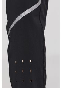 adidas Performance Spodnie damskie kolor czarny z nadrukiem. Kolor: czarny. Materiał: tkanina, materiał. Wzór: nadruk