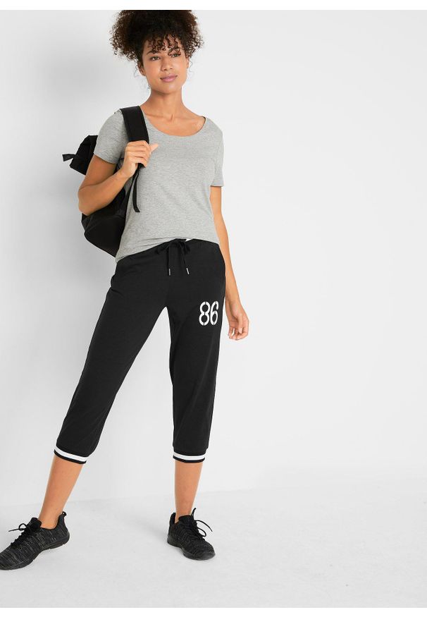 bonprix - Spodnie joggingowe 3/4 z mieszanki bawełny. Kolor: czarny. Materiał: materiał, bawełna. Styl: sportowy