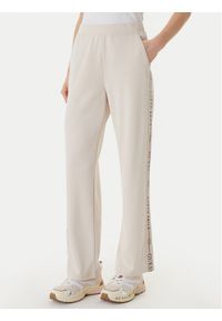 Guess Spodnie dresowe W6GB29 K3282 Beżowy Regular Fit. Kolor: beżowy. Materiał: syntetyk #1