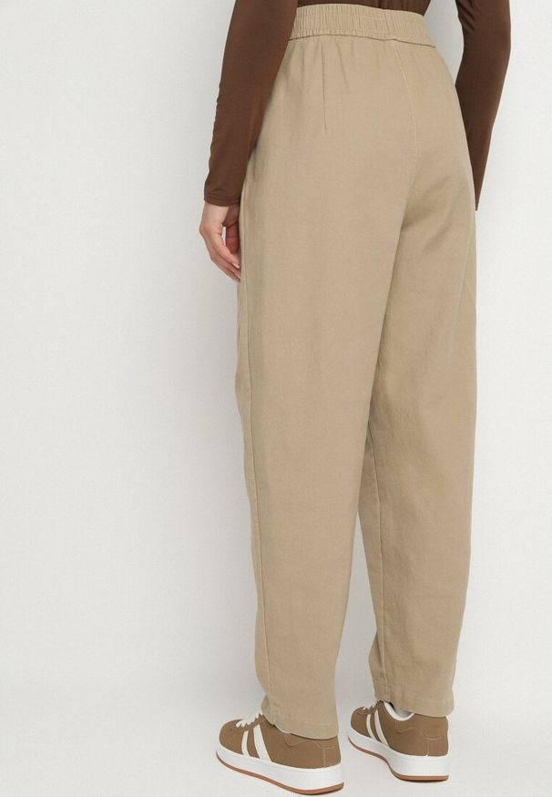 Born2be - Beżowe Szerokie Bawełniane Spodnie z Wysokim Stanem i Podwiniętymi Nogawkami Nalofia. Okazja: na randkę, na co dzień. Stan: podwyższony. Kolor: beżowy. Materiał: bawełna. Styl: casual