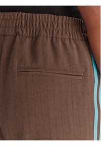 Adidas - adidas Spodnie dresowe JX5308 Brązowy Regular Fit. Kolor: brązowy. Materiał: syntetyk #5