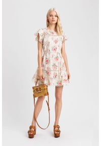 TwinSet - Krótka sukienka w kwiaty Twinset. Materiał: bawełna. Wzór: kwiaty. Typ sukienki: rozkloszowane. Długość: mini
