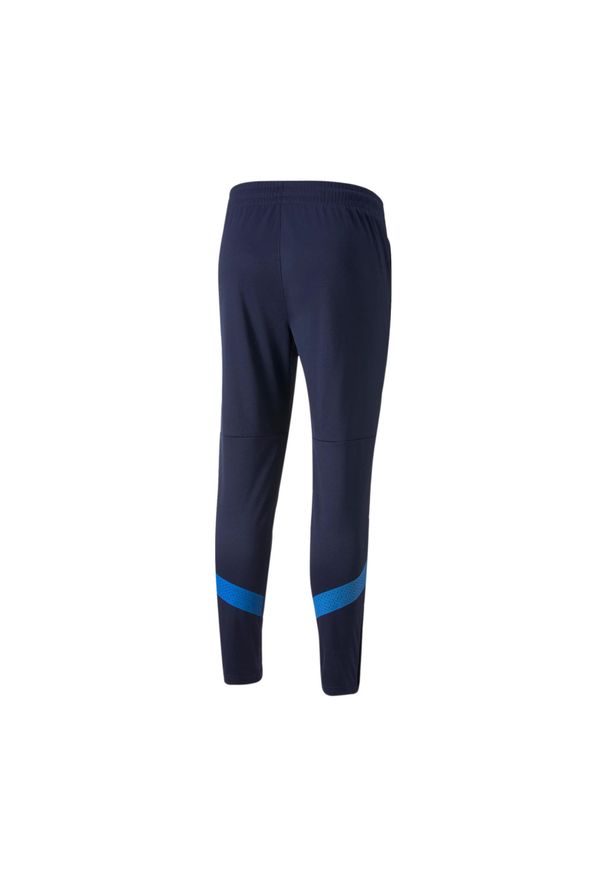 Puma - Spodnie treningowe Italie 2022. Kolor: niebieski. Materiał: materiał. Sport: piłka nożna