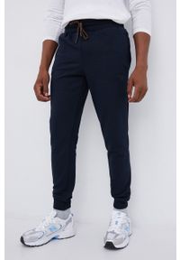 Cross Jeans Spodnie męskie kolor granatowy gładkie. Kolor: niebieski. Materiał: materiał. Wzór: gładki #1