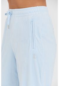 Juicy Couture - JUICY COUTURE Niebieskie spodnie dresowe Lilian Jogger. Kolor: niebieski. Materiał: dresówka #4