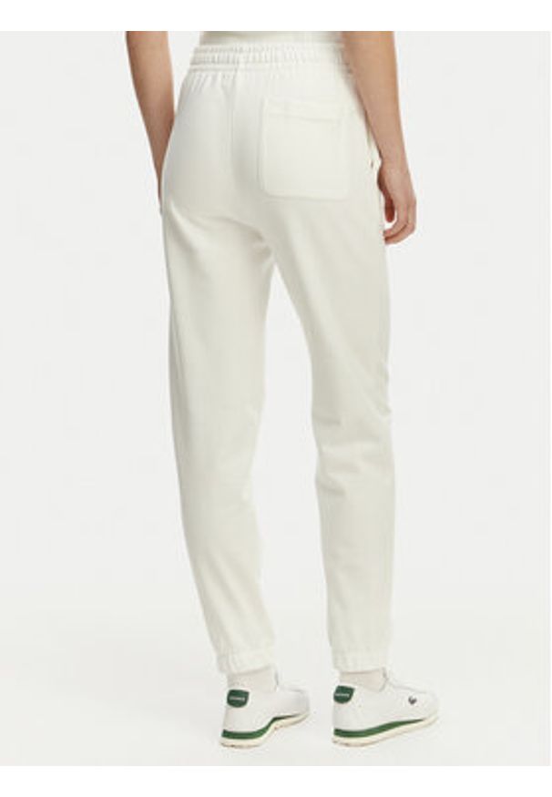 Lacoste Spodnie dresowe XF7604 Biały Regular Fit. Kolor: biały. Materiał: bawełna