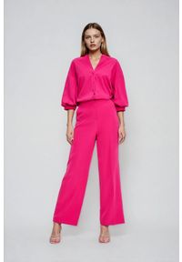 MOODO - Spodnie z kantem różowe. Kolor: różowy. Materiał: poliester, elastan #1