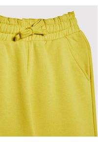 United Colors of Benetton - United Colors Of Benetton Spodnie dresowe 3QLACF00H Żółty Regular Fit. Kolor: żółty. Materiał: dresówka, bawełna