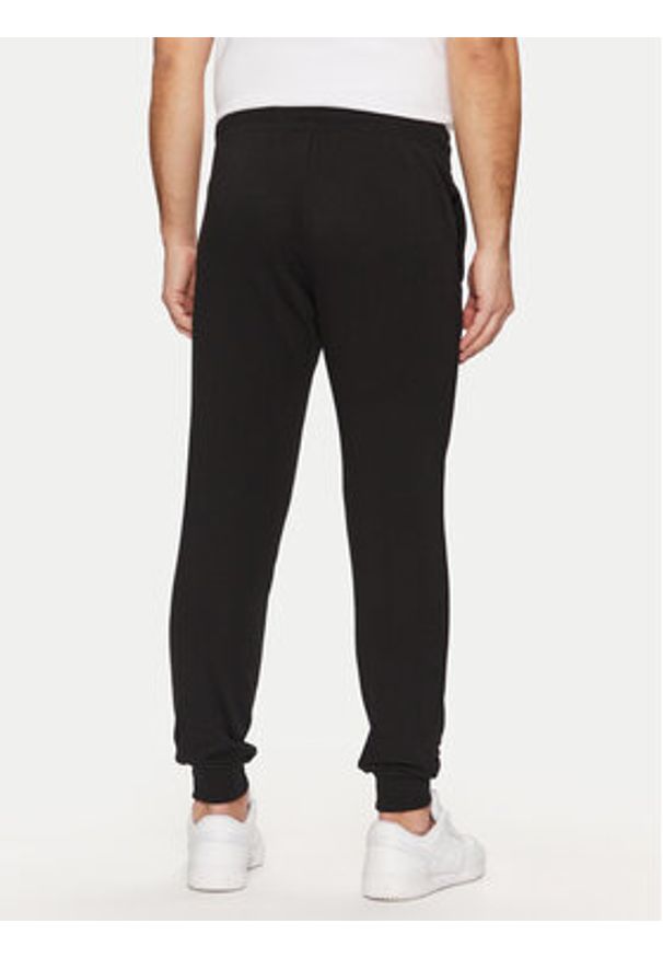 Jack & Jones - Jack&Jones Spodnie dresowe Gordon 12268442 Czarny Regular Fit. Kolor: czarny. Materiał: bawełna, syntetyk