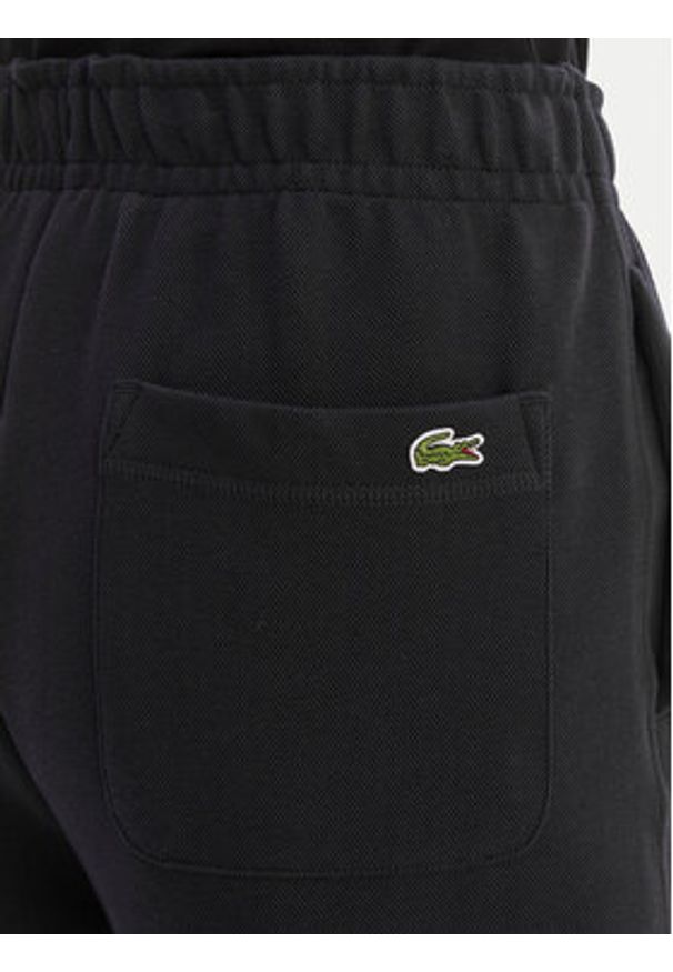 Lacoste Spodnie dresowe XF5244 Granatowy Regular Fit. Kolor: niebieski. Materiał: syntetyk