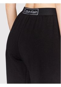 Calvin Klein Underwear Spodnie dresowe 000QS6802E Czarny Regular Fit. Kolor: czarny. Materiał: dresówka, syntetyk