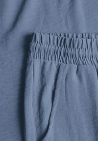 Born2be - Jasnoniebieski Komplet z Wiskozą Koszulka z Krótkim Rękawem i Luźne Spodnie na Gumce z Kieszniami Efraline. Kolor: niebieski. Materiał: wiskoza #6