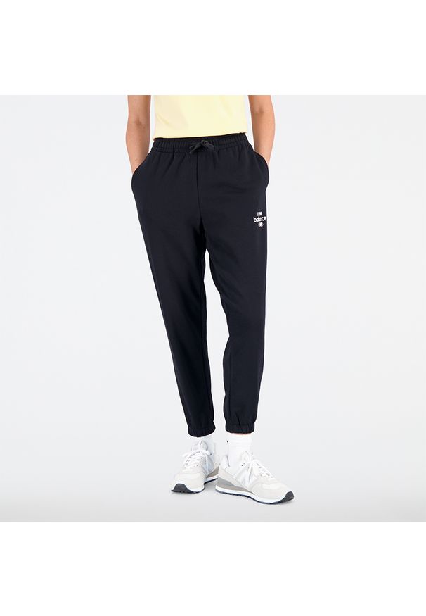 Spodnie damskie New Balance WP31508BK – czarne. Kolor: czarny. Materiał: poliester, dresówka, bawełna