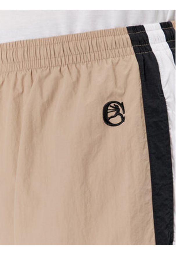 Champion Spodnie dresowe 220008 Beżowy Custom Fit. Kolor: beżowy. Materiał: syntetyk