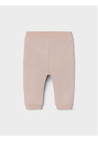 Name it - NAME IT Spodnie dresowe 13212722 Różowy Regular Fit. Kolor: różowy. Materiał: bawełna