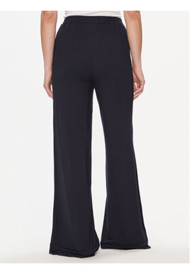 TOMMY HILFIGER - Tommy Hilfiger Spodnie dresowe UW0UW05195 Granatowy Relaxed Fit. Kolor: niebieski. Materiał: dresówka