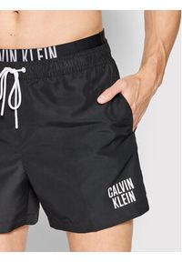 Calvin Klein Swimwear Szorty kąpielowe Medium Double KM0KM00740 Czarny Regular Fit. Kolor: czarny. Materiał: syntetyk