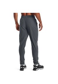 Spodnie dresowe męskie Under Armour STRETCH WOVEN PANT. Kolor: szary. Materiał: dresówka