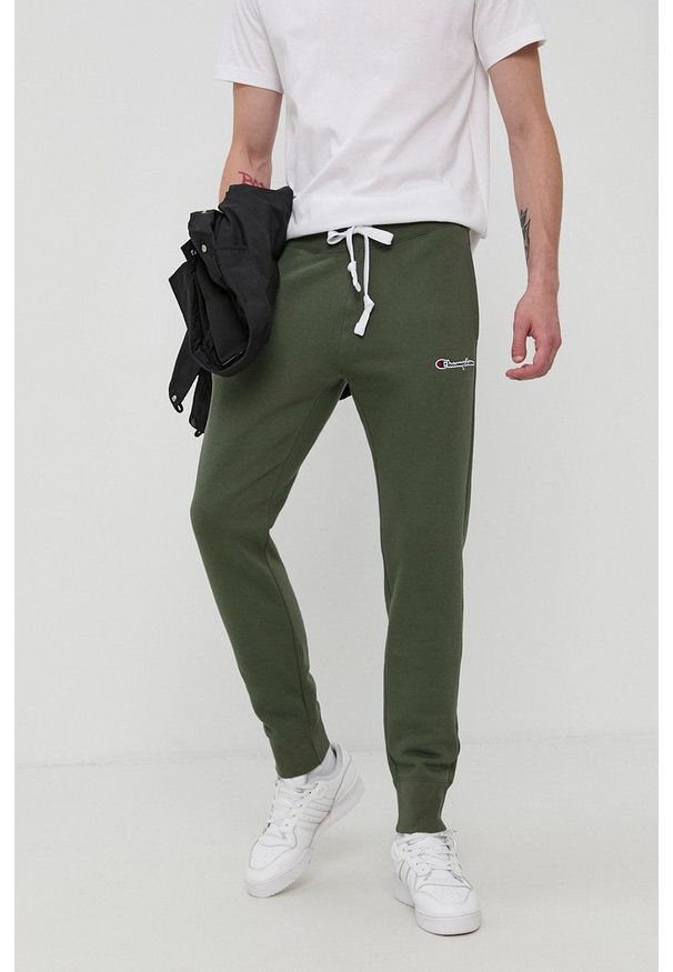 Champion - Spodnie. Kolor: zielony. Materiał: dzianina, bawełna