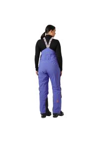 Damskie spodnie narciarskie cargo na szelkach Helly Hansen Switch. Kolor: fioletowy. Sezon: zima. Sport: narciarstwo #1