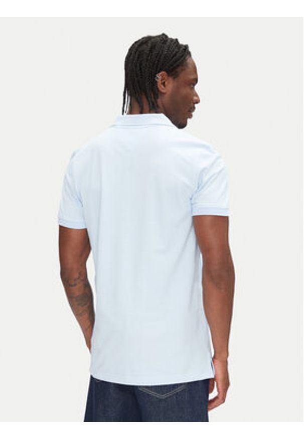 Tommy Jeans Polo DM0DM20676 Błękitny Slim Fit. Typ kołnierza: polo. Kolor: niebieski. Materiał: bawełna