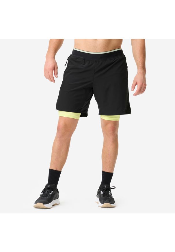 DOMYOS - Spodenki fitness cardio męskie. Kolor: żółty, czarny, wielokolorowy. Materiał: poliester, elastan, materiał. Sport: fitness