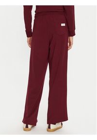 TOMMY HILFIGER - Tommy Hilfiger Spodnie dresowe UW0UW04771 Bordowy Relaxed Fit. Kolor: czerwony. Materiał: dresówka #2