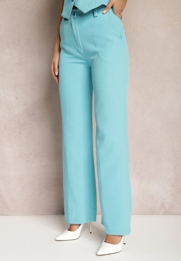 Renee - Niebieskie Spodnie w Kant w Garniturowym Stylu High Waist Jaessa. Stan: podwyższony. Kolor: niebieski. Styl: elegancki