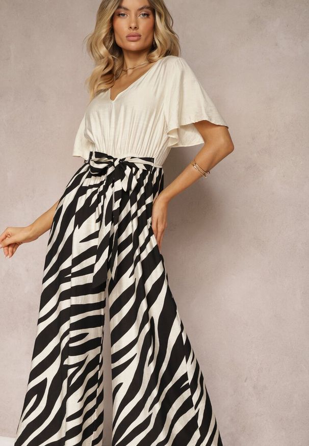 Renee - Czarno-Biały Kombinezon z Materiałowym Paskiem i Szerokimi Rękawami Nellda. Kolor: czarny. Materiał: materiał. Sezon: lato