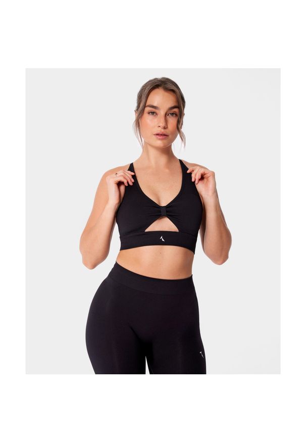 Bezszwowy biustonosz sportowy z wycięciem Carpatree Eris. Kolor: czarny. Materiał: prążkowany. Sport: fitness