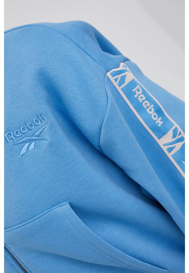 Reebok Bluza damska z kapturem z aplikacją. Typ kołnierza: kaptur. Kolor: niebieski. Materiał: materiał, poliester. Wzór: aplikacja