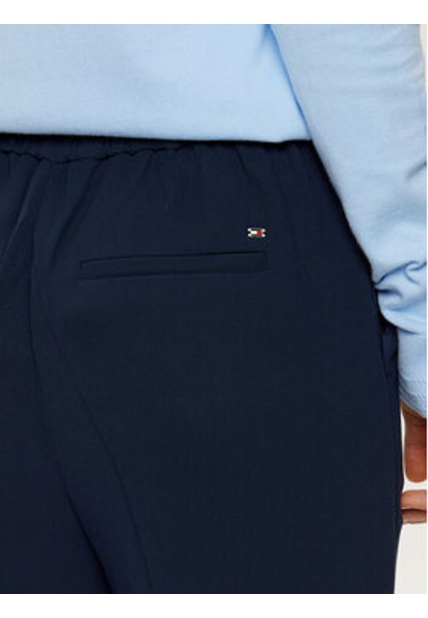TOMMY HILFIGER - Tommy Hilfiger Chinosy WW0WW45450 Granatowy Slim Fit. Kolor: niebieski. Materiał: syntetyk