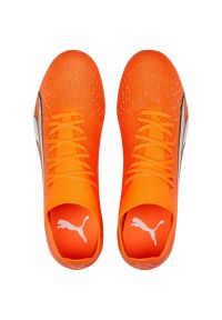 Buty piłkarskie Puma Ultra Match FG/AG M 107217 01 pomarańcze i czerwienie pomarańczowe. Kolor: pomarańczowy. Szerokość cholewki: normalna. Sport: piłka nożna