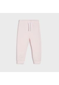 Sinsay - Spodnie dresowe - Różowy. Kolor: różowy. Materiał: dresówka