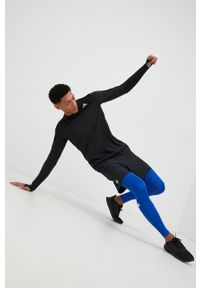 adidas Performance legginsy treningowe męskie gładkie. Kolor: niebieski. Materiał: skóra, materiał. Technologia: Techfit (Adidas). Wzór: gładki. Sport: fitness
