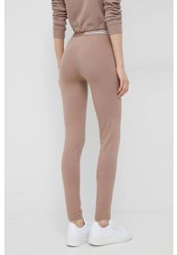 TOMMY HILFIGER - Tommy Hilfiger legginsy damskie kolor beżowy gładkie. Kolor: beżowy. Materiał: dzianina. Wzór: gładki #4
