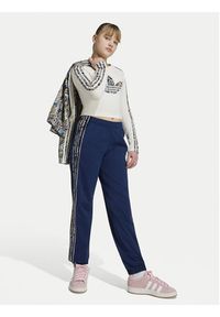 Adidas - adidas Spodnie dresowe Sst KR9187 Granatowy Loose Fit. Kolor: niebieski. Materiał: syntetyk #5