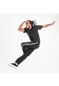 STAREVER - Koszulka z krótkim rękawem do tańca urban dance unisex Starever. Kolor: czarny. Materiał: bawełna, elastan, poliester, materiał. Długość rękawa: krótki rękaw. Długość: krótkie. Sport: taniec