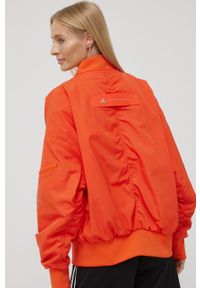 Adidas by Stella McCartney - adidas by Stella McCartney wiatrówka H59970 kolor pomarańczowy przejściowa oversize. Typ kołnierza: kołnierzyk stójkowy. Kolor: pomarańczowy. Materiał: tkanina, materiał. Wzór: ze splotem #7
